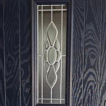 Textured glass panel in a composite front door.